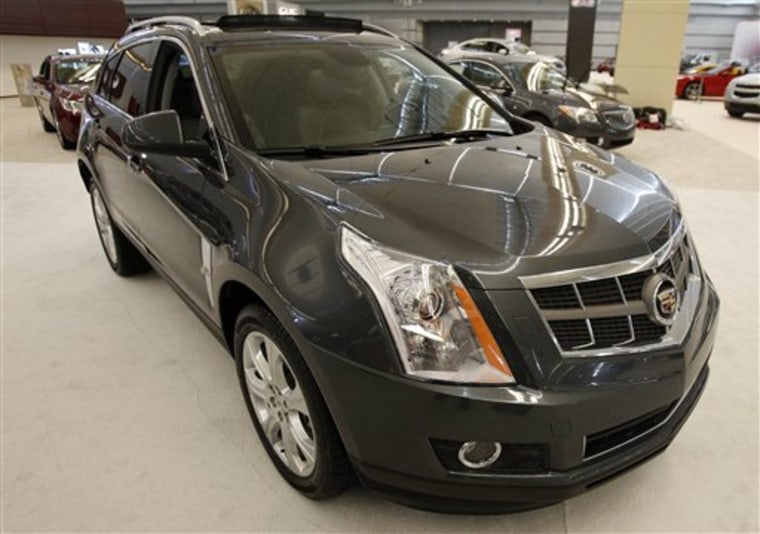 A 2011 Cadillac SRX AWD at the opening of the Pittsburgh International Auto Show. General Motors is recalling more than 47,000 Cadillac SRX crossover vehicles because of a problem with the side air bags. 